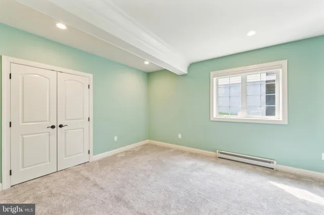 wooden floor and window in a room