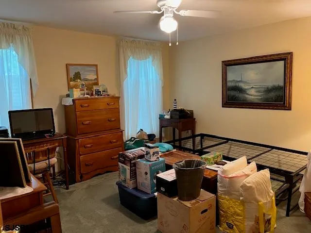 a view of a workspace with furniture