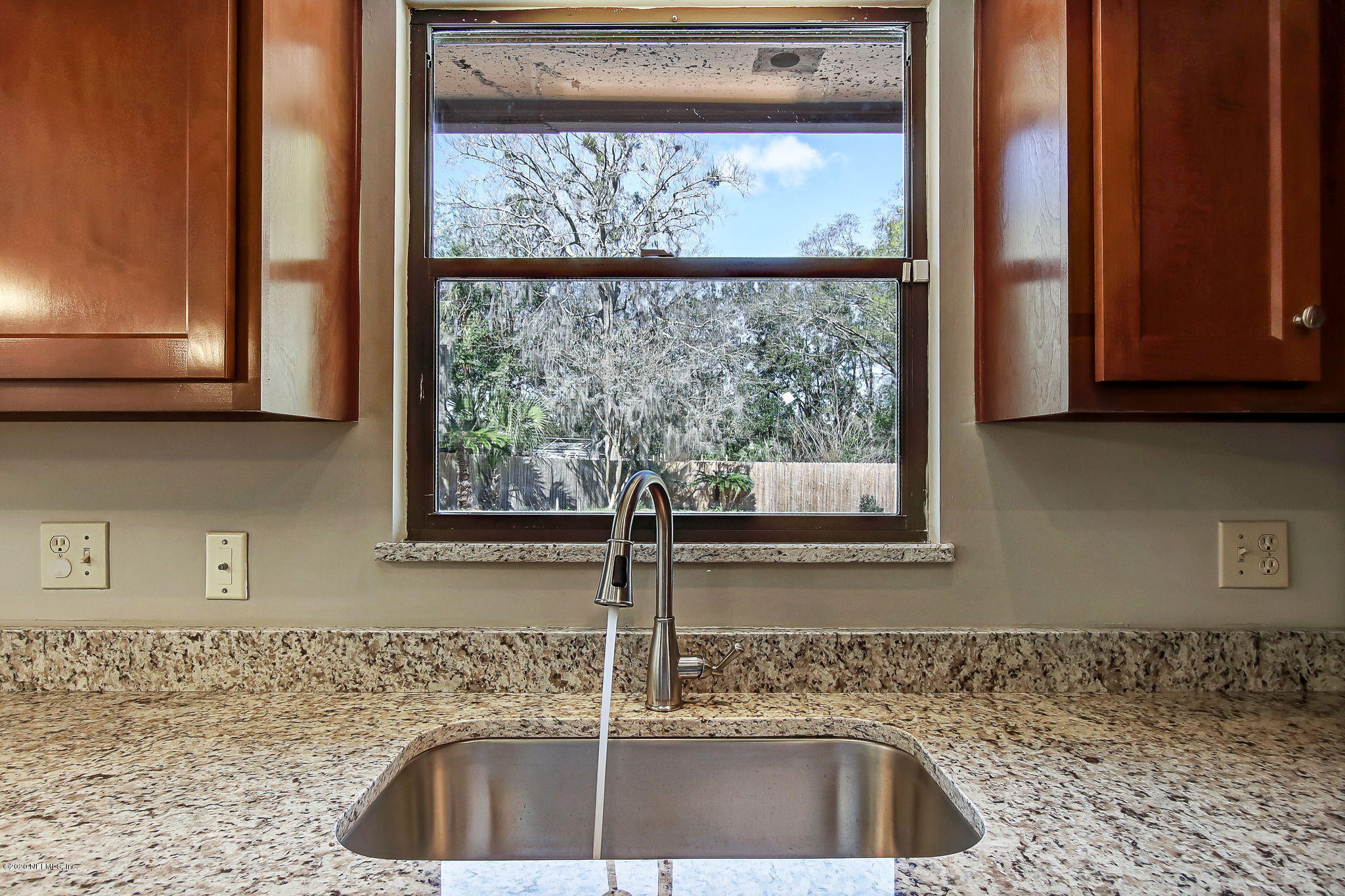 350 Foxridge Road Orange Park, FL 32065 - Photo 29 of 54 a kitchen with a sink and a window