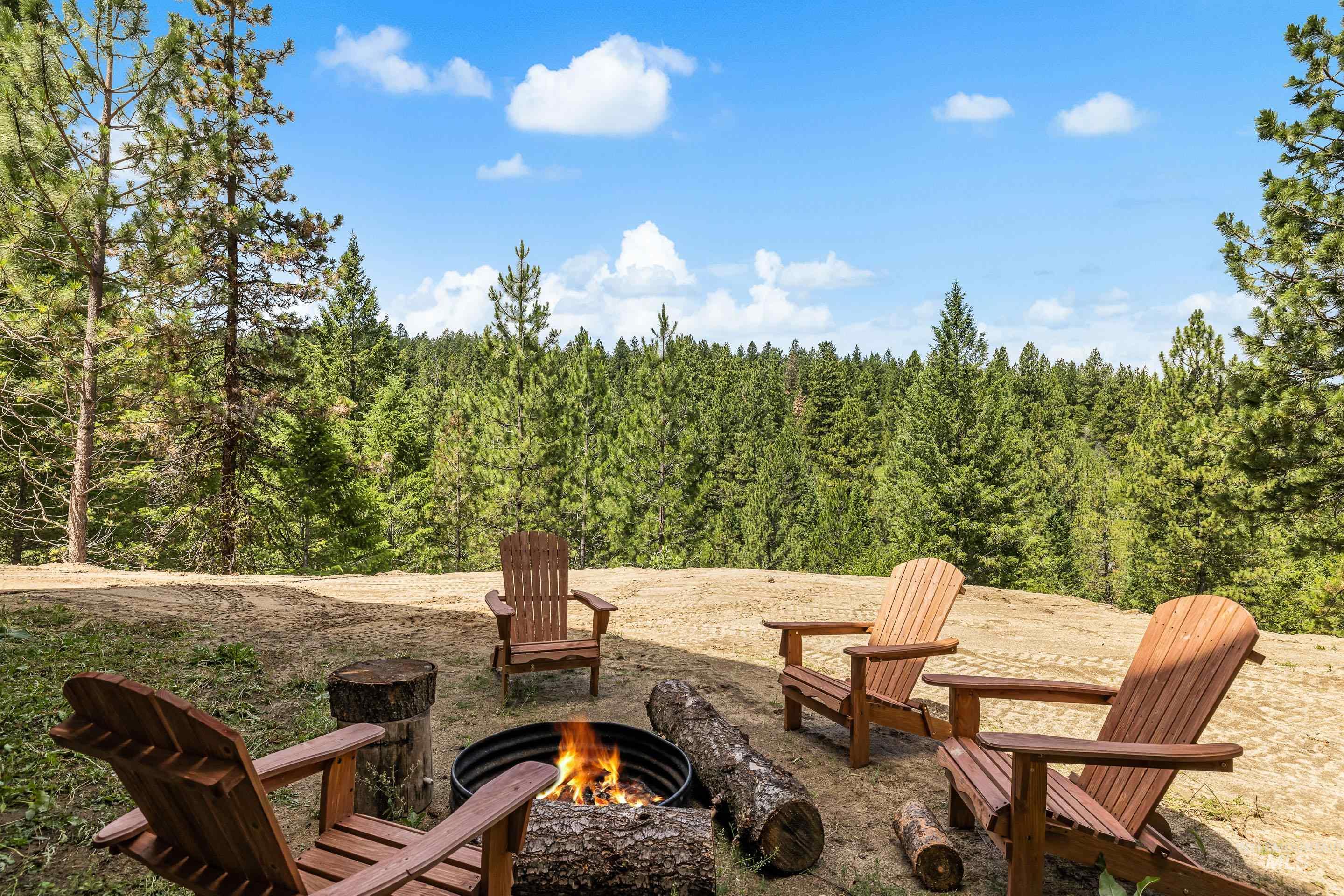 92 Cruickshank Road Horseshoe Bend, ID 83629 - Photo 46 of 50 Outdoor fire pit area featuring a circular metal fire ring