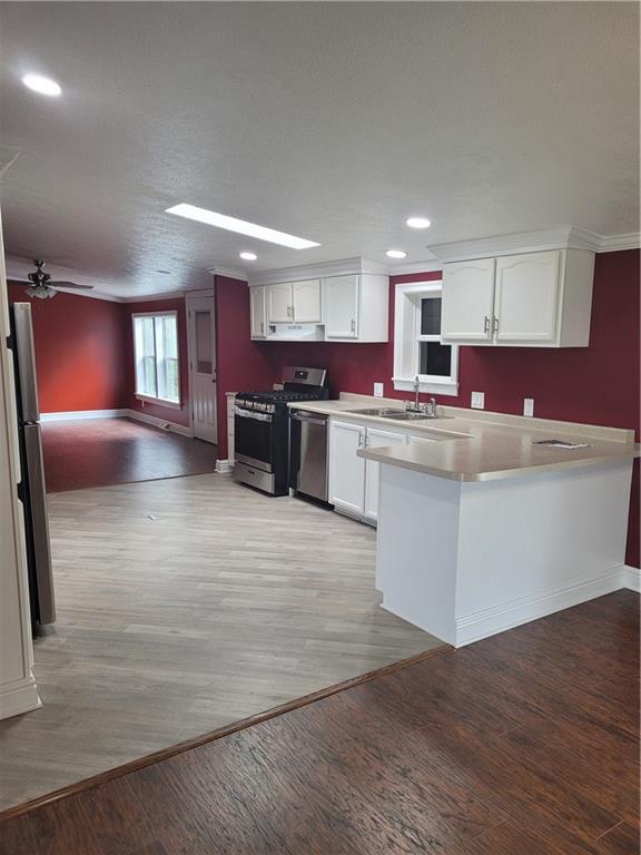 839 Hummingbird Lane Apollo, PA 15613 - Photo 18 of 26 a kitchen with stainless steel appliances granite countertop a sink stove and refrigerator