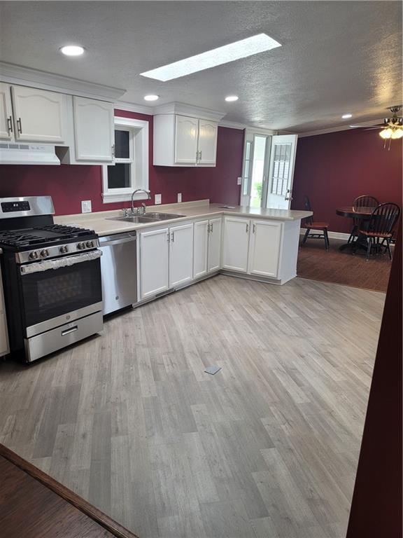 839 Hummingbird Lane Apollo, PA 15613 - Photo 19 of 26 a kitchen with stainless steel appliances granite countertop a stove and a sink