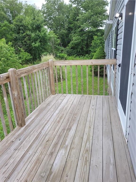 839 Hummingbird Lane Apollo, PA 15613 - Photo 22 of 26 a view of balcony with wooden floor and fence
