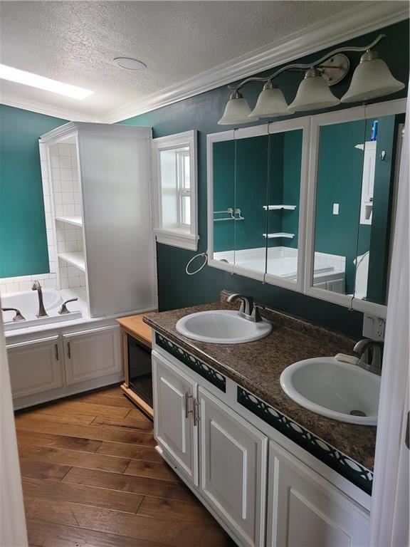 839 Hummingbird Lane Apollo, PA 15613 - Photo 6 of 26 a spacious bathroom with a granite countertop sink and a mirror