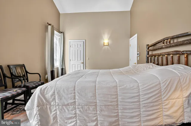 a view of a livingroom with furniture and a fireplace