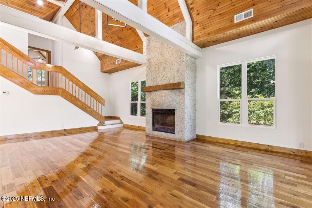 22 Belted Kingfisher Road Fernandina Beach, FL 32034 - Photo 12 of 70 a view of an entryway with a fireplace