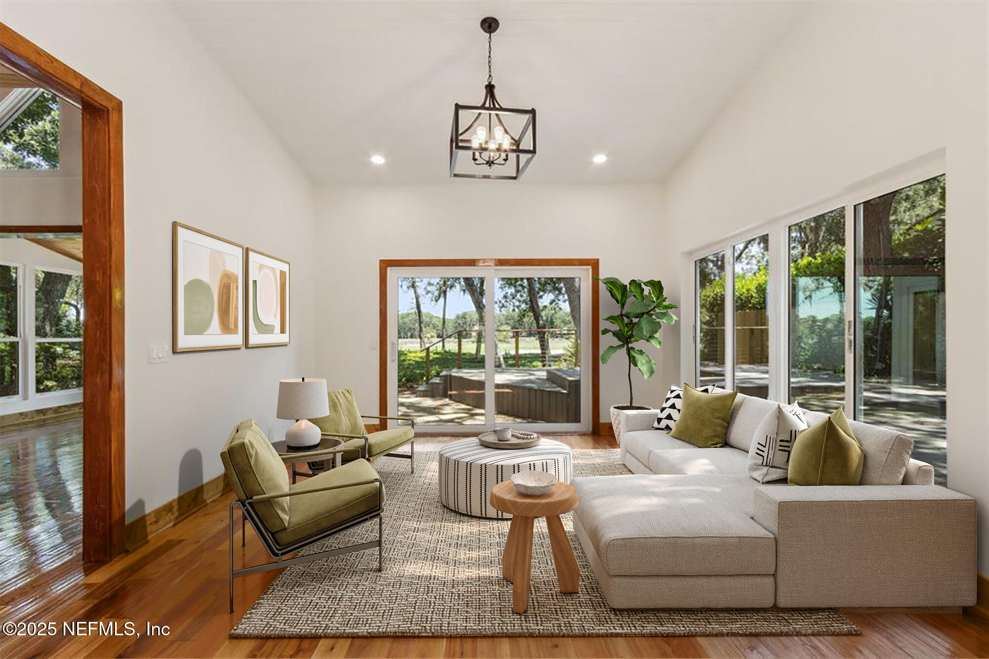 22 Belted Kingfisher Road Fernandina Beach, FL 32034 - Photo 18 of 70 a living room with furniture and a large window