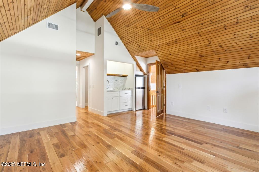 22 Belted Kingfisher Road Fernandina Beach, FL 32034 - Photo 28 of 70 a view of empty room with wooden floor