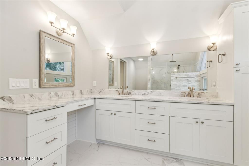 22 Belted Kingfisher Road Fernandina Beach, FL 32034 - Photo 30 of 70 a bathroom with a granite countertop sink mirror and window