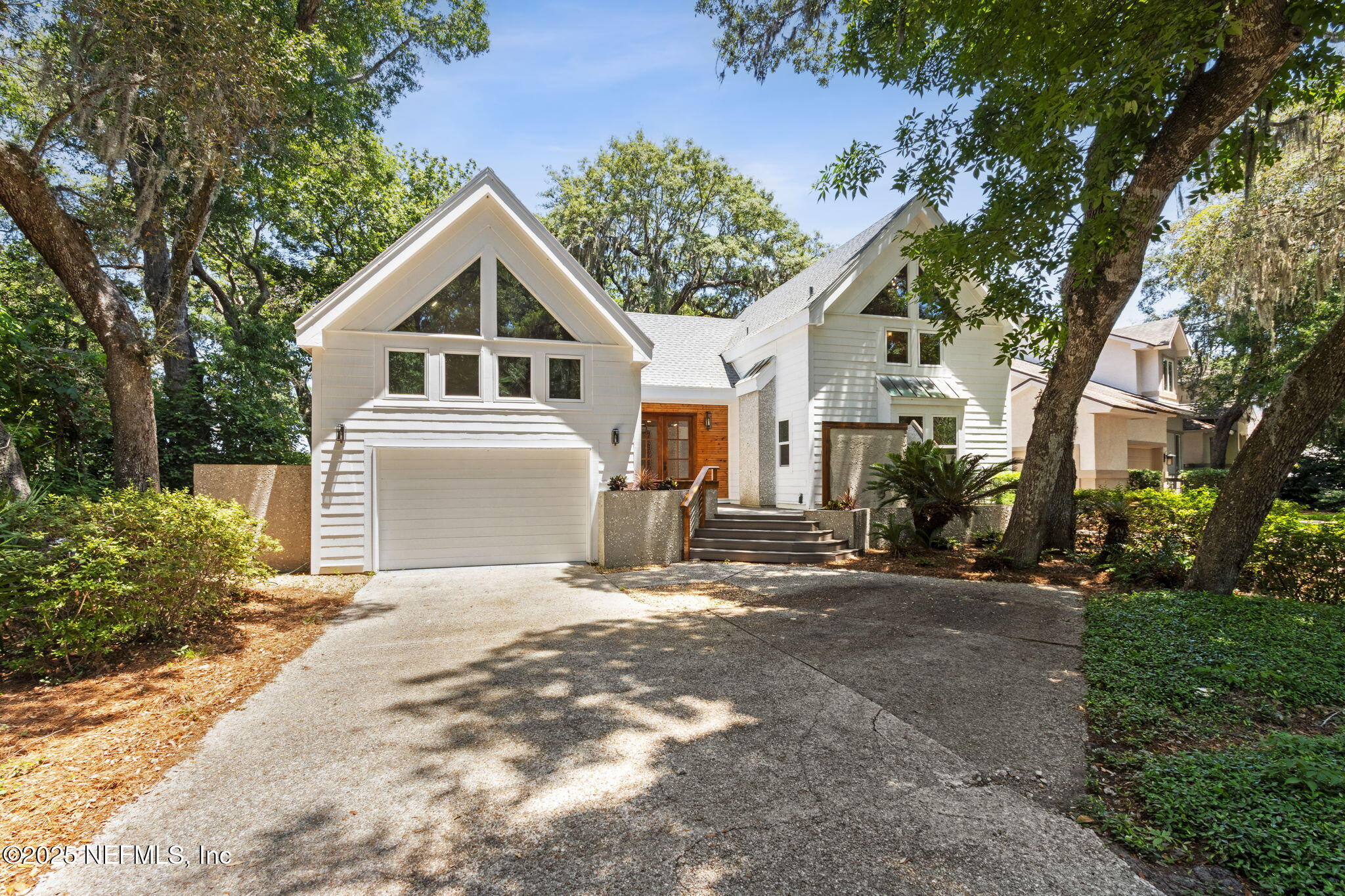 22 Belted Kingfisher Road Fernandina Beach, FL 32034 - Photo 70 of 70 a view of a house with a yard