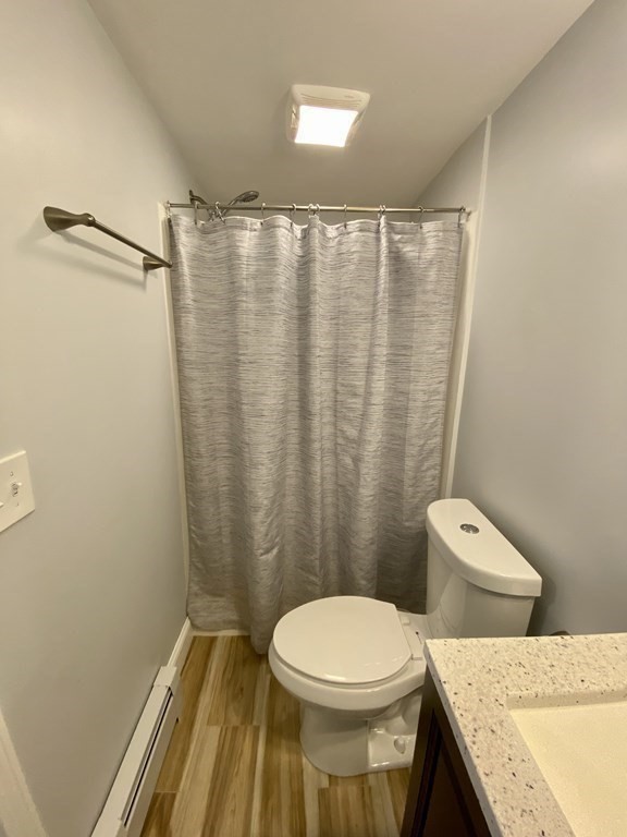 3 Leland Hill Road Sutton, MA 01590 - Photo 17 of 38 a bathroom with a granite countertop toilet and a sink