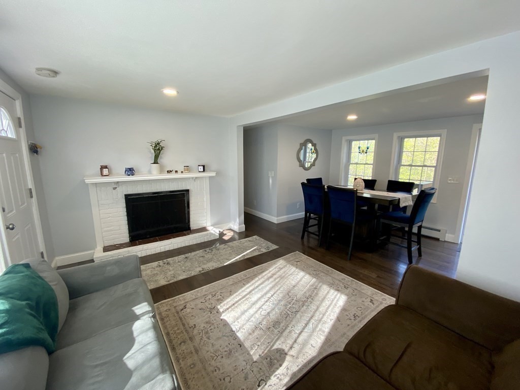 3 Leland Hill Road Sutton, MA 01590 - Photo 3 of 38 a living room with furniture and a fireplace
