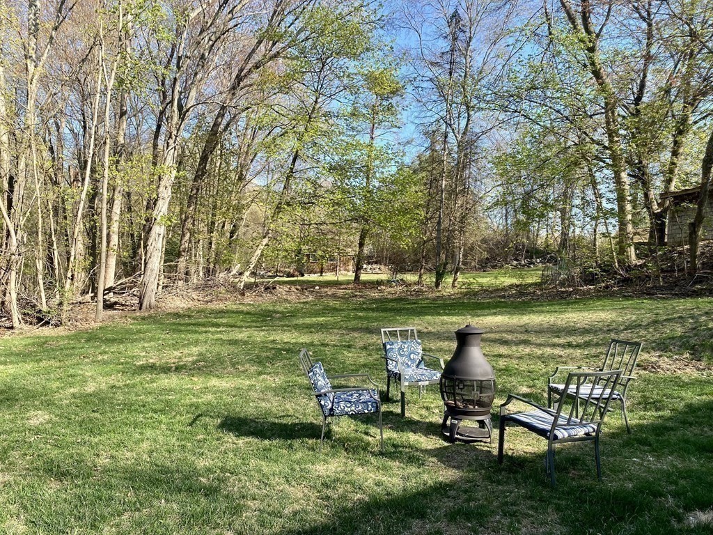 3 Leland Hill Road Sutton, MA 01590 - Photo 37 of 38 a garden view with a sitting space