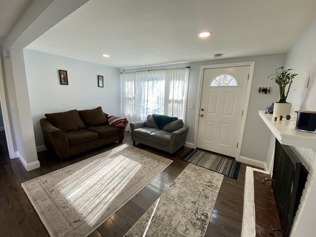3 Leland Hill Road Sutton, MA 01590 - Photo 6 of 38 a living room with furniture and a rug