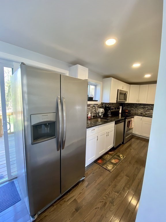3 Leland Hill Road Sutton, MA 01590 - Photo 8 of 38 a kitchen with stainless steel appliances granite countertop a refrigerator and a stove