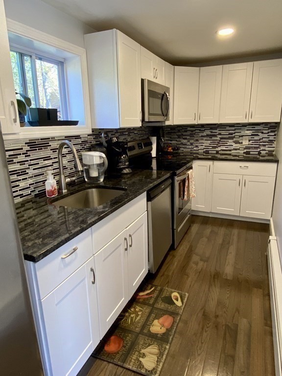 3 Leland Hill Road Sutton, MA 01590 - Photo 10 of 38 a kitchen with granite countertop a sink and cabinets