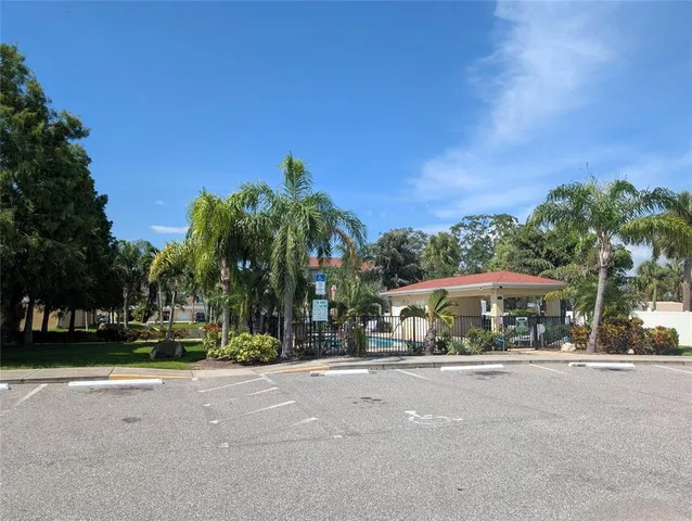 a street view with a building in the background