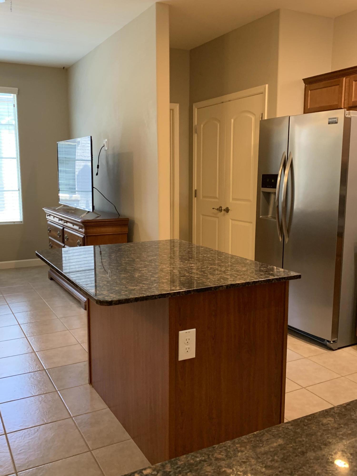 2150 West Alameda Road, Unit 1373 Phoenix, AZ 85085 - Photo 9 of 27 View toward Pantry & Powder Room