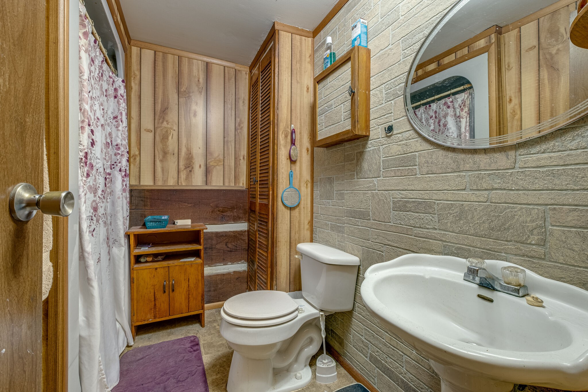 1889 Ford Road Lebanon, TN 37087 - Photo 11 of 18 a bathroom with a toilet sink and mirror
