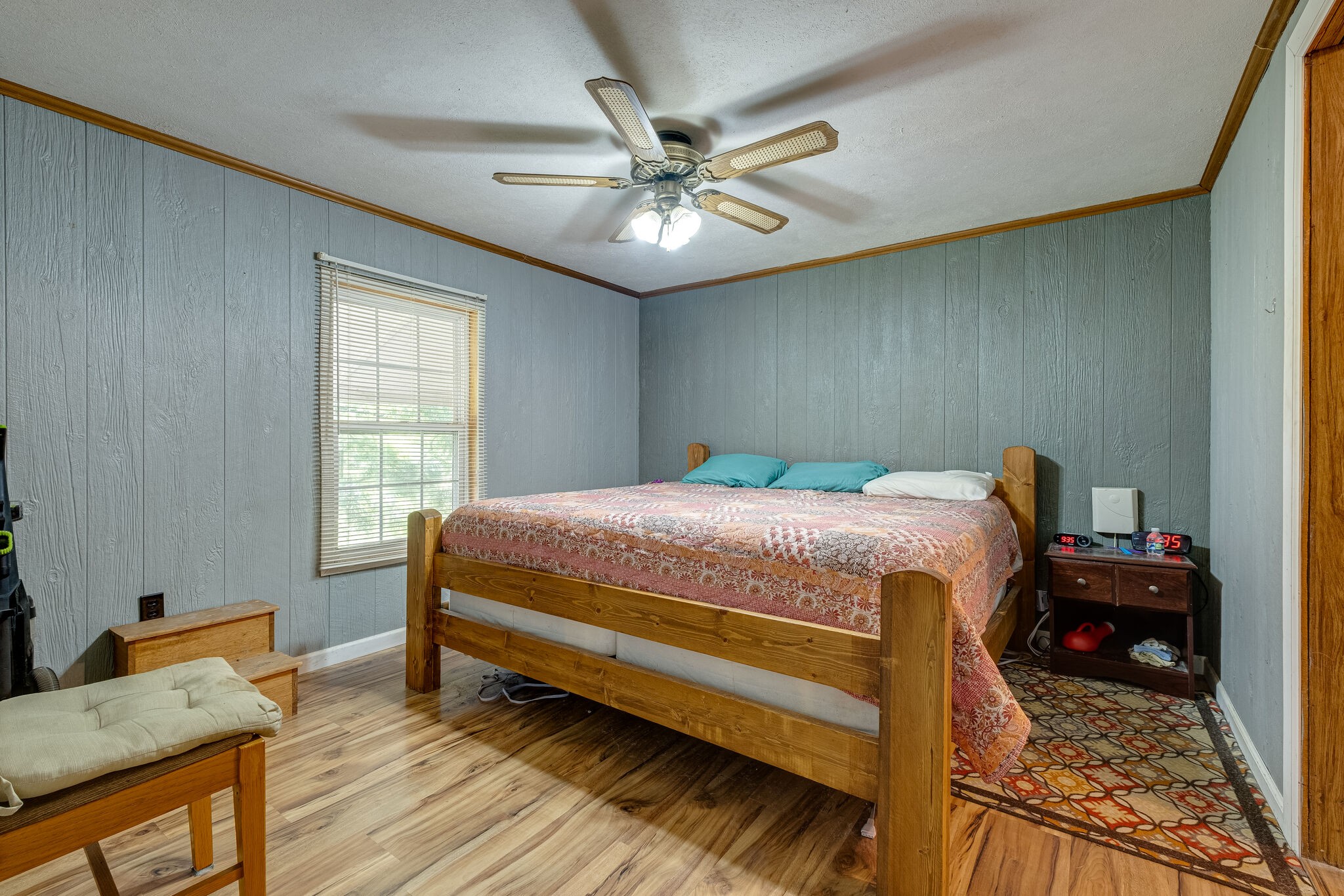 1889 Ford Road Lebanon, TN 37087 - Photo 8 of 18 a bedroom with a bed and wooden floor