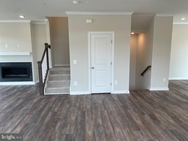 8235 Front Loop Rockville, MD 20855 - Photo 10 of 22 a view of empty room with wooden floor and fireplace