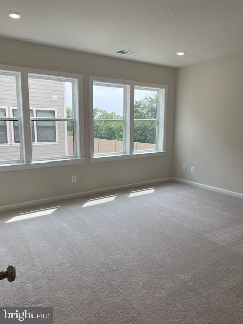 8235 Front Loop Rockville, MD 20855 - Photo 12 of 22 an empty room with a window