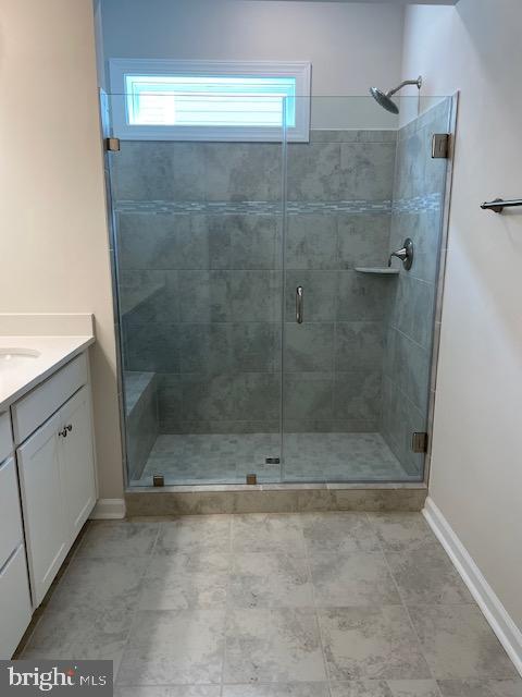 8235 Front Loop Rockville, MD 20855 - Photo 14 of 22 a bathroom with a shower