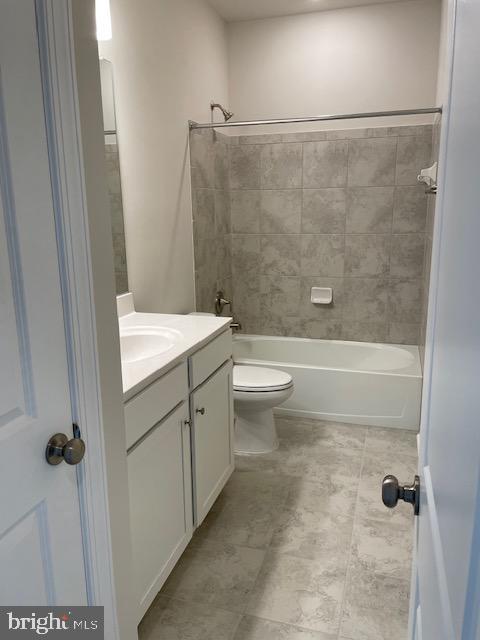 8235 Front Loop Rockville, MD 20855 - Photo 16 of 22 a bathroom with a sink a toilet and shower