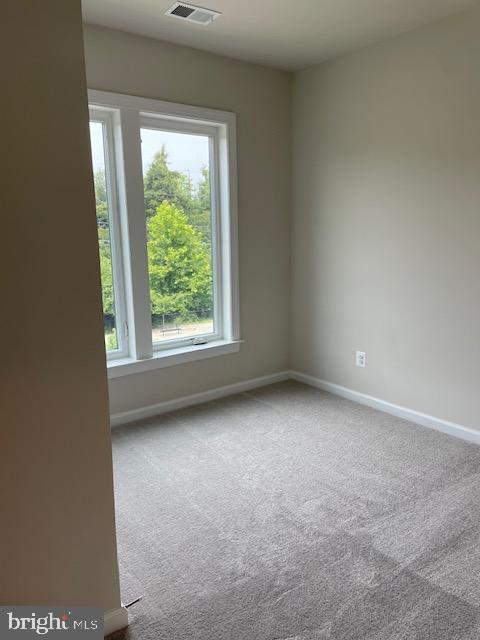 8235 Front Loop Rockville, MD 20855 - Photo 18 of 22 a view of a window in an empty room