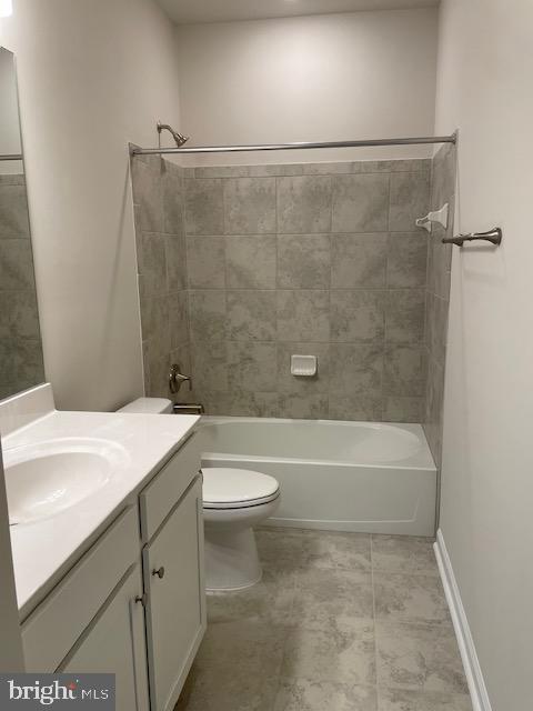 8235 Front Loop Rockville, MD 20855 - Photo 21 of 22 a bathroom with a sink a toilet and a bathtub