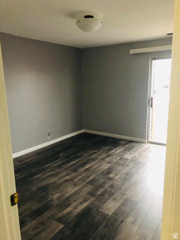 88 West 50 South, Unit B5 Centerville, UT 84014 - Photo 13 of 33 Spare room with dark wood-style flooring