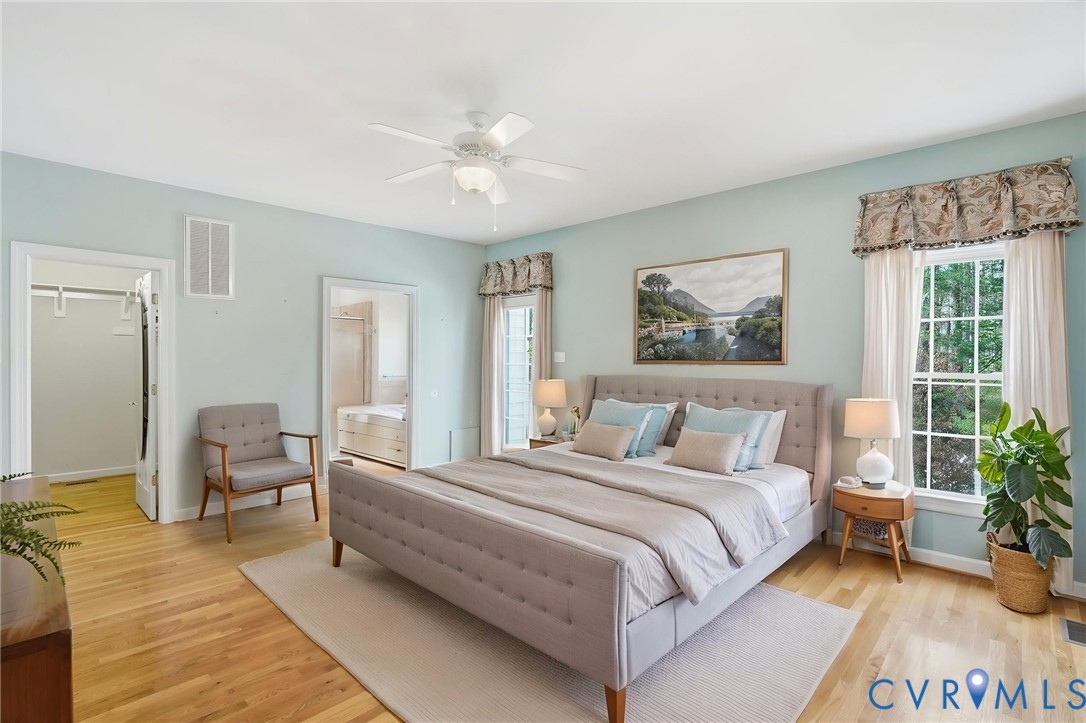 14430 Overlook Ridge Lane Beaverdam, VA 23015 - Photo 27 of 71 a bedroom with a large bed couch and a window