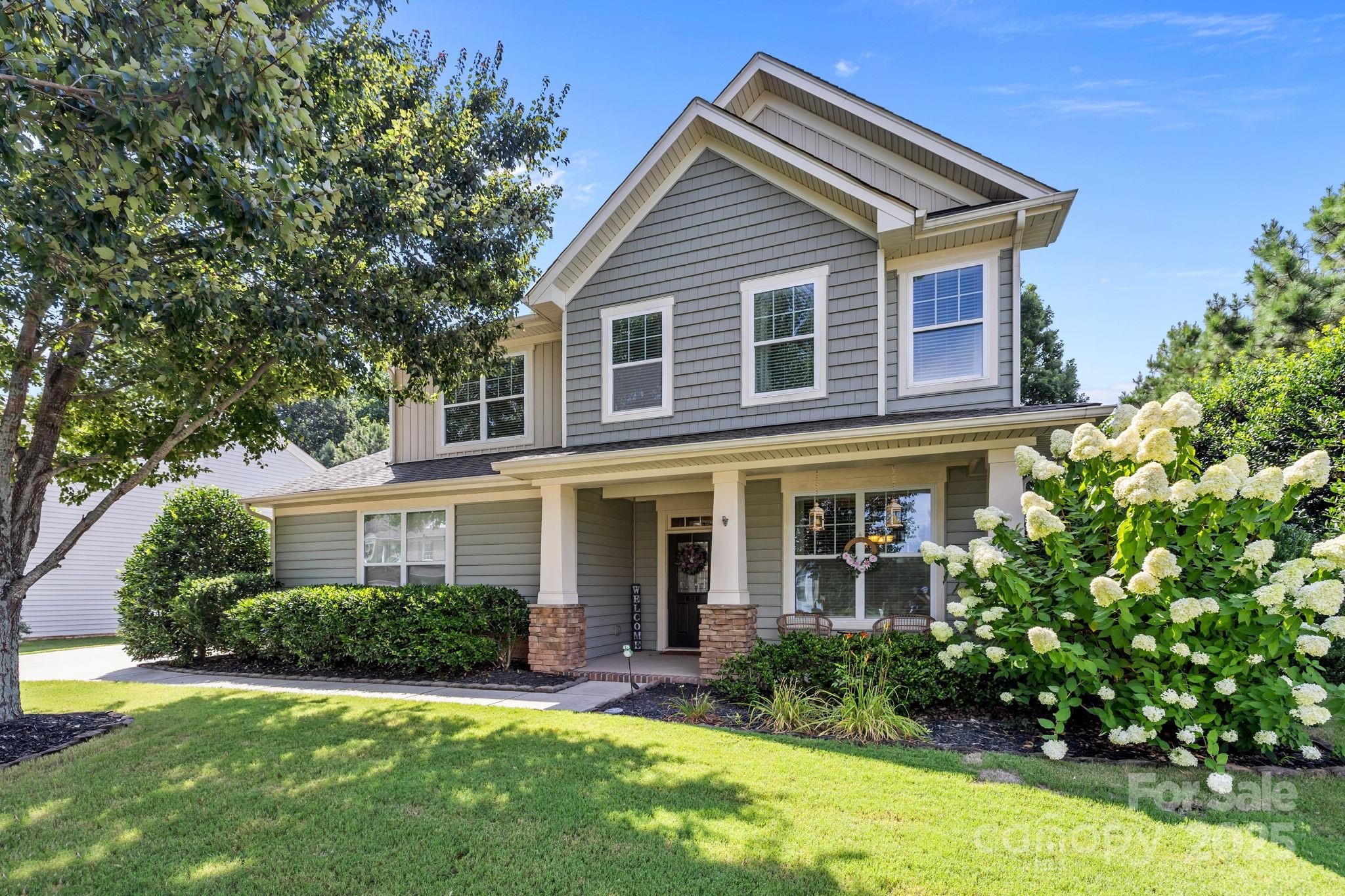 324 Windell Drive Fort Mill, SC 29708 - Photo 2 of 47 a front view of a house with a yard