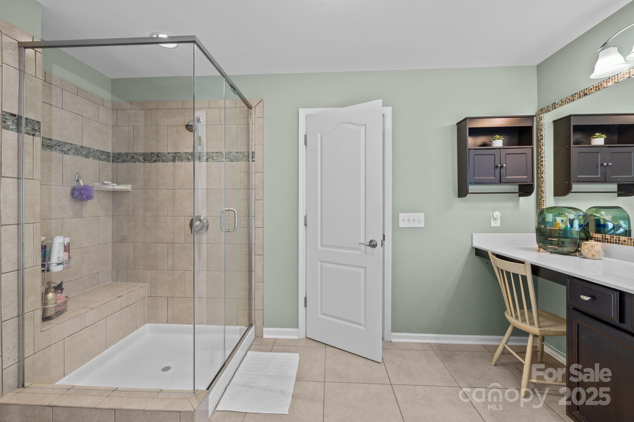 324 Windell Drive Fort Mill, SC 29708 - Photo 27 of 47 a bathroom with a shower a mirror and a sink