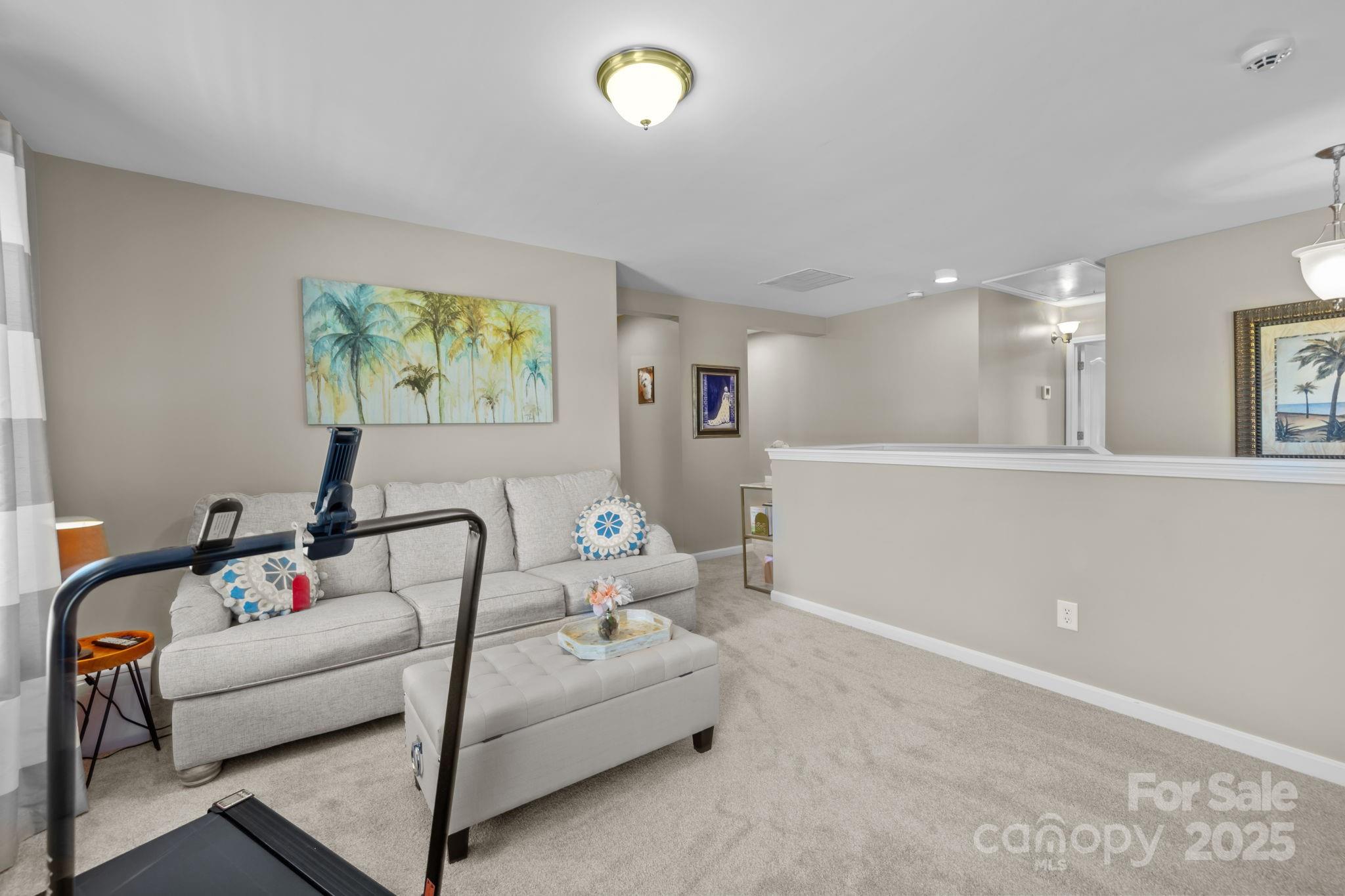 324 Windell Drive Fort Mill, SC 29708 - Photo 30 of 47 a living room with furniture and a painting on the wall