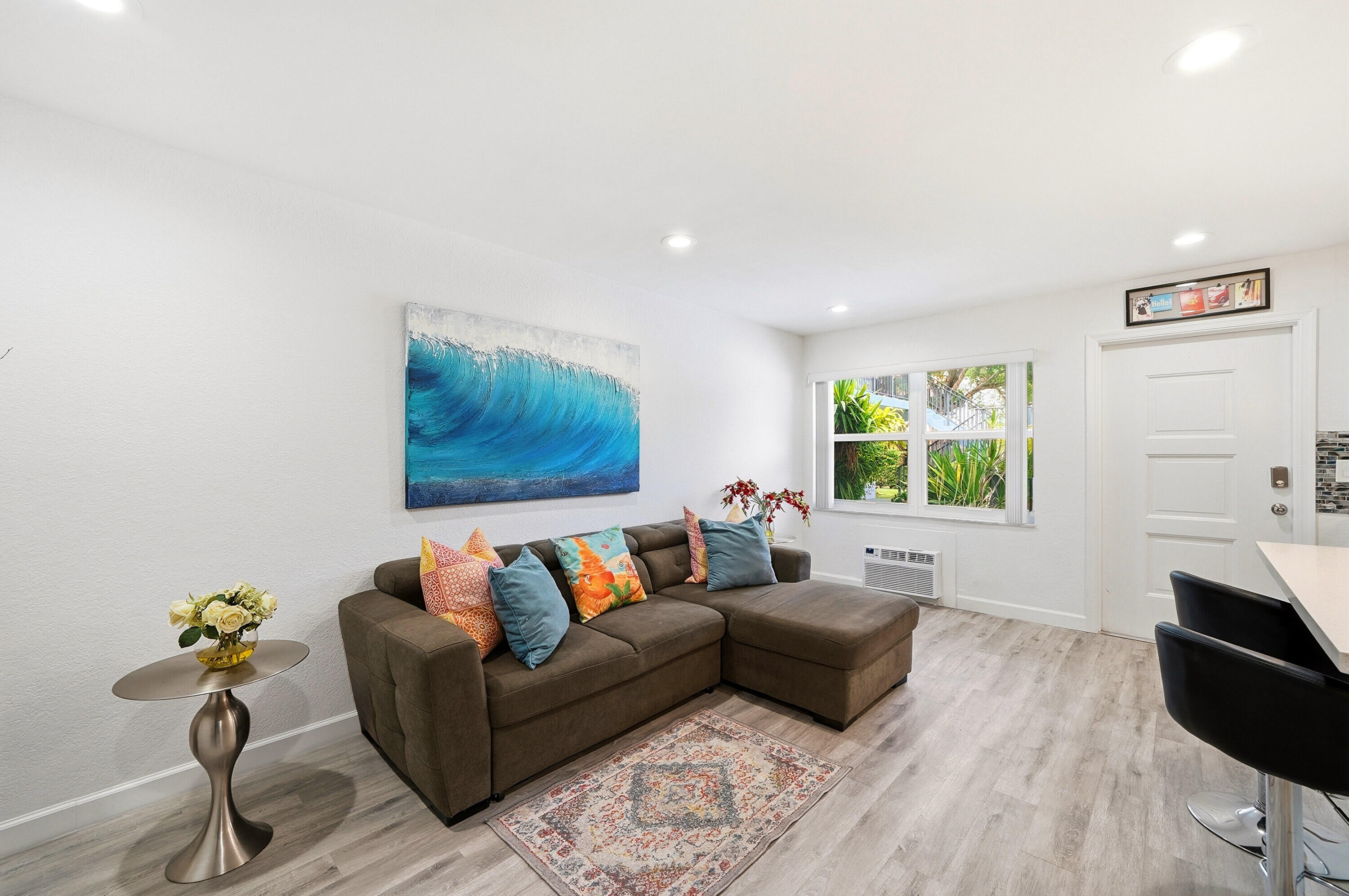 3510 Harrison Street, Unit 4 Hollywood, FL 33021 - Photo 5 of 31 a living room with furniture and a couch