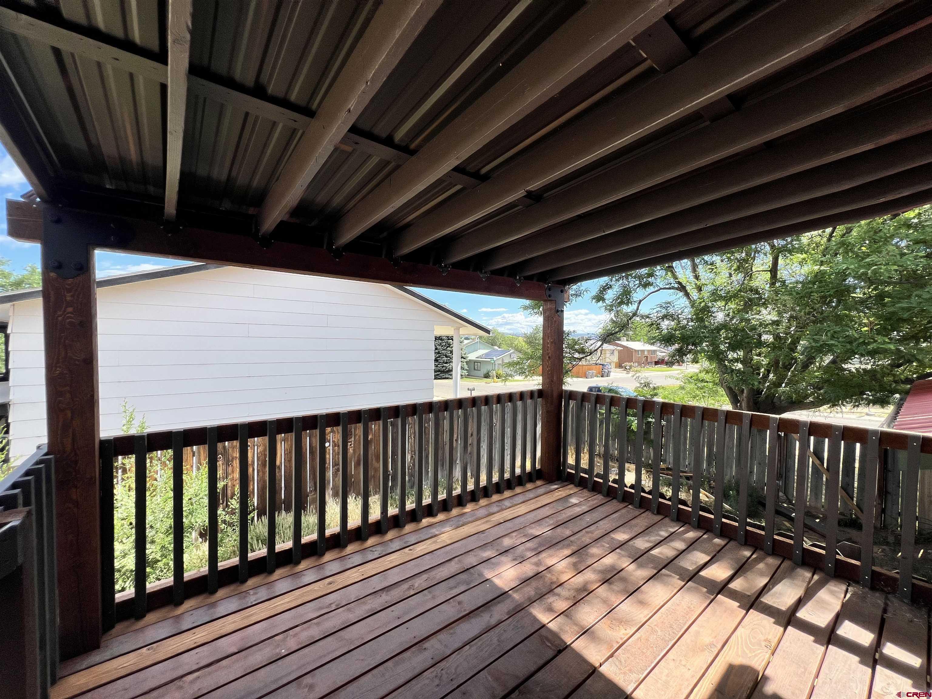 1328 Jackson Street Cortez, CO 81321 - Photo 11 of 37 a view of wooden deck