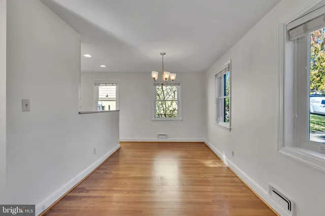 a view of an empty room and window