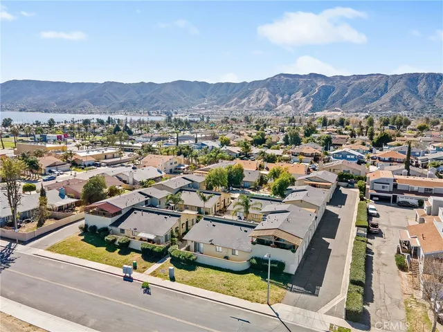 an aerial view of residential houses and trees