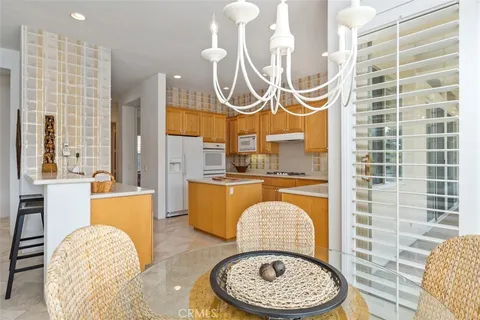 a bathroom with a sink a mirror and a bathtub