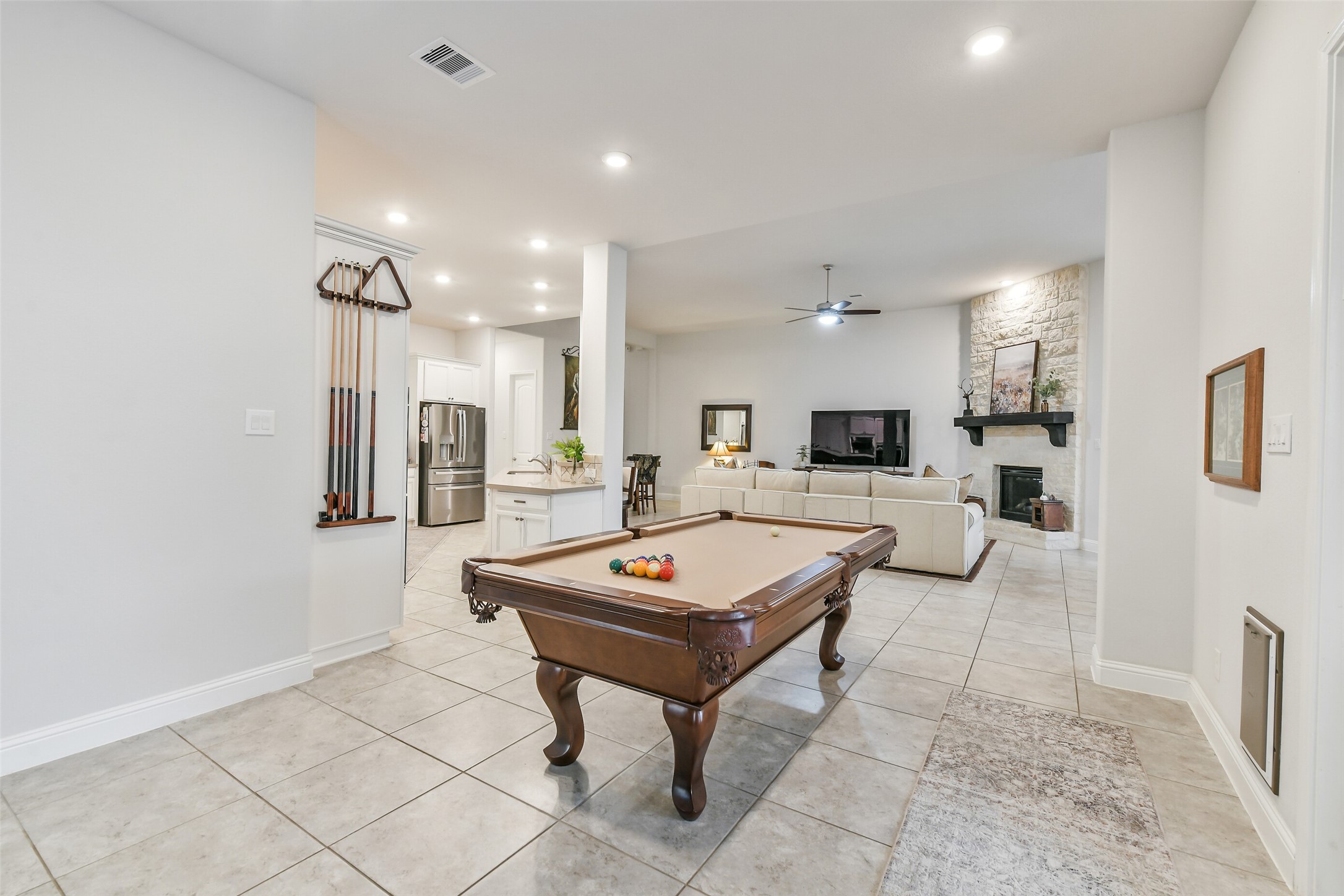 19206 Chestnut Colt Trail Tomball, TX 77377 - Photo 15 of 50 a living room with furniture a table and chairs