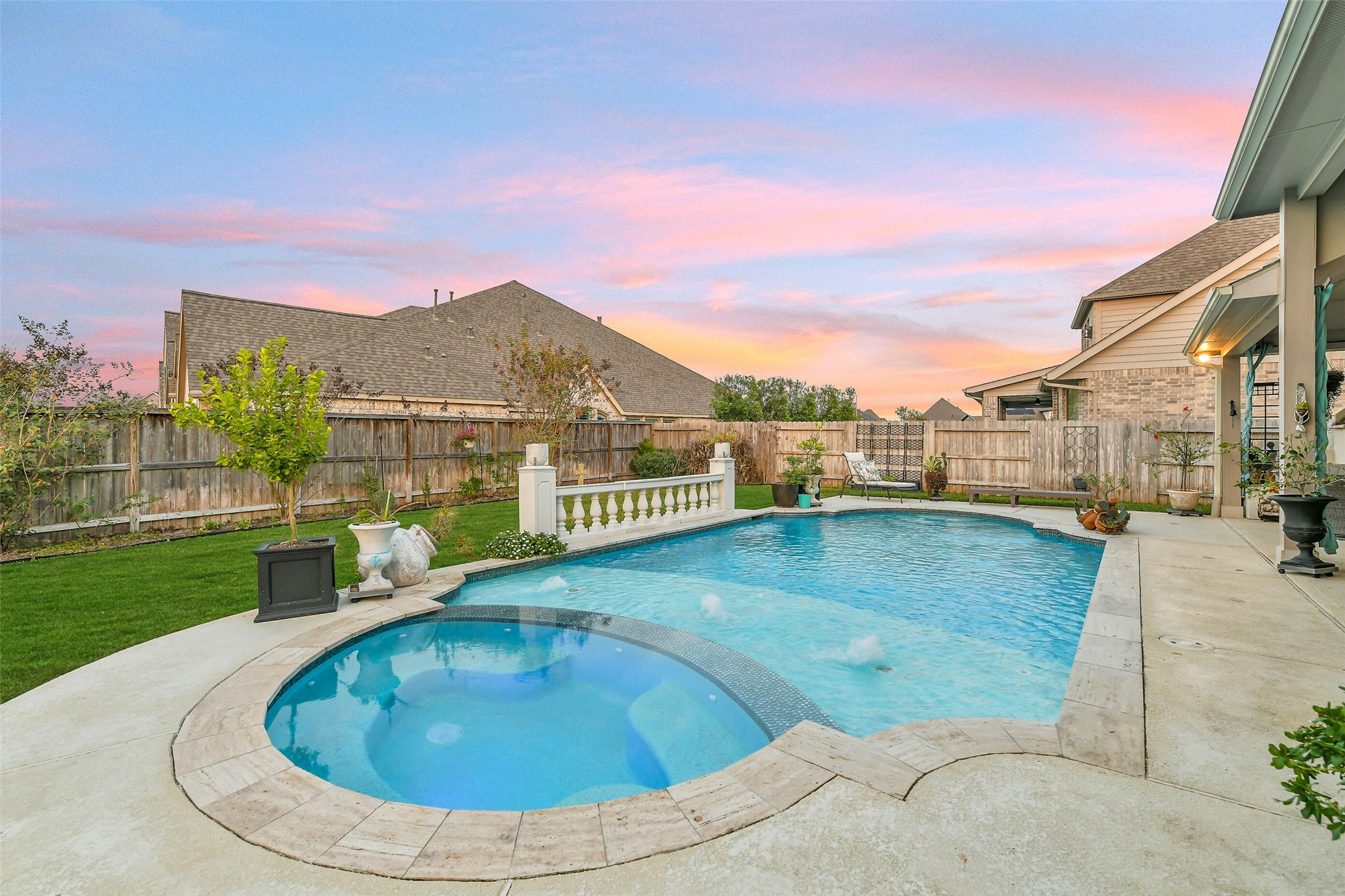 19206 Chestnut Colt Trail Tomball, TX 77377 - Photo 2 of 50 a view of a swimming pool with a lounge chair