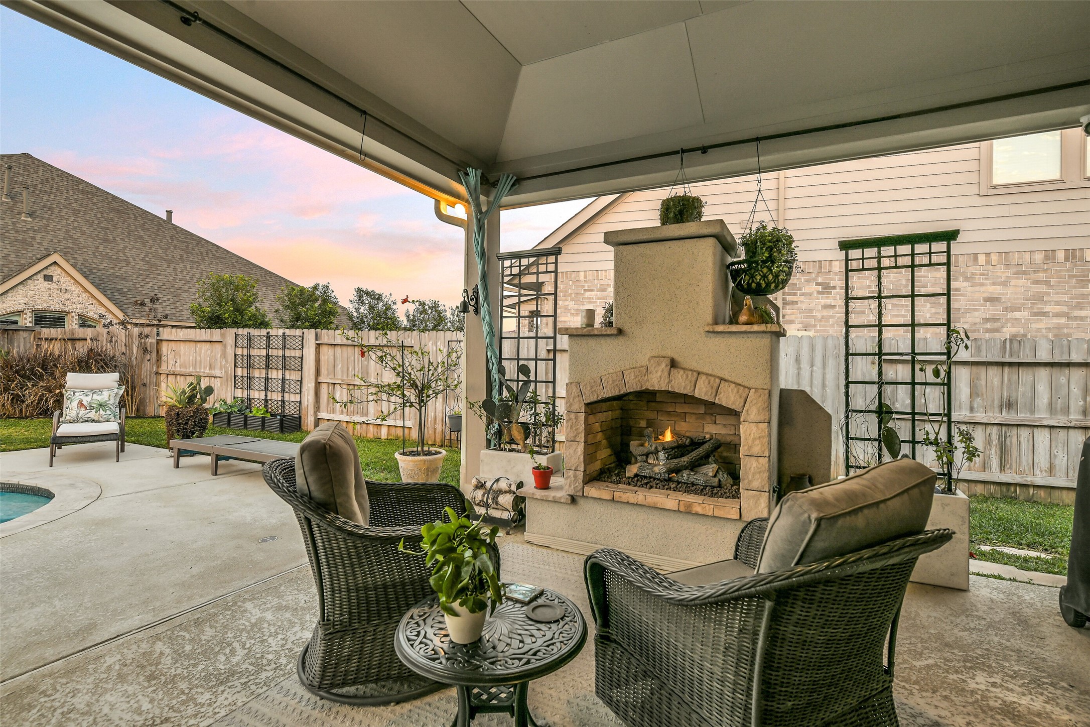 19206 Chestnut Colt Trail Tomball, TX 77377 - Photo 34 of 50 a building outdoor space with patio furniture and potted plants
