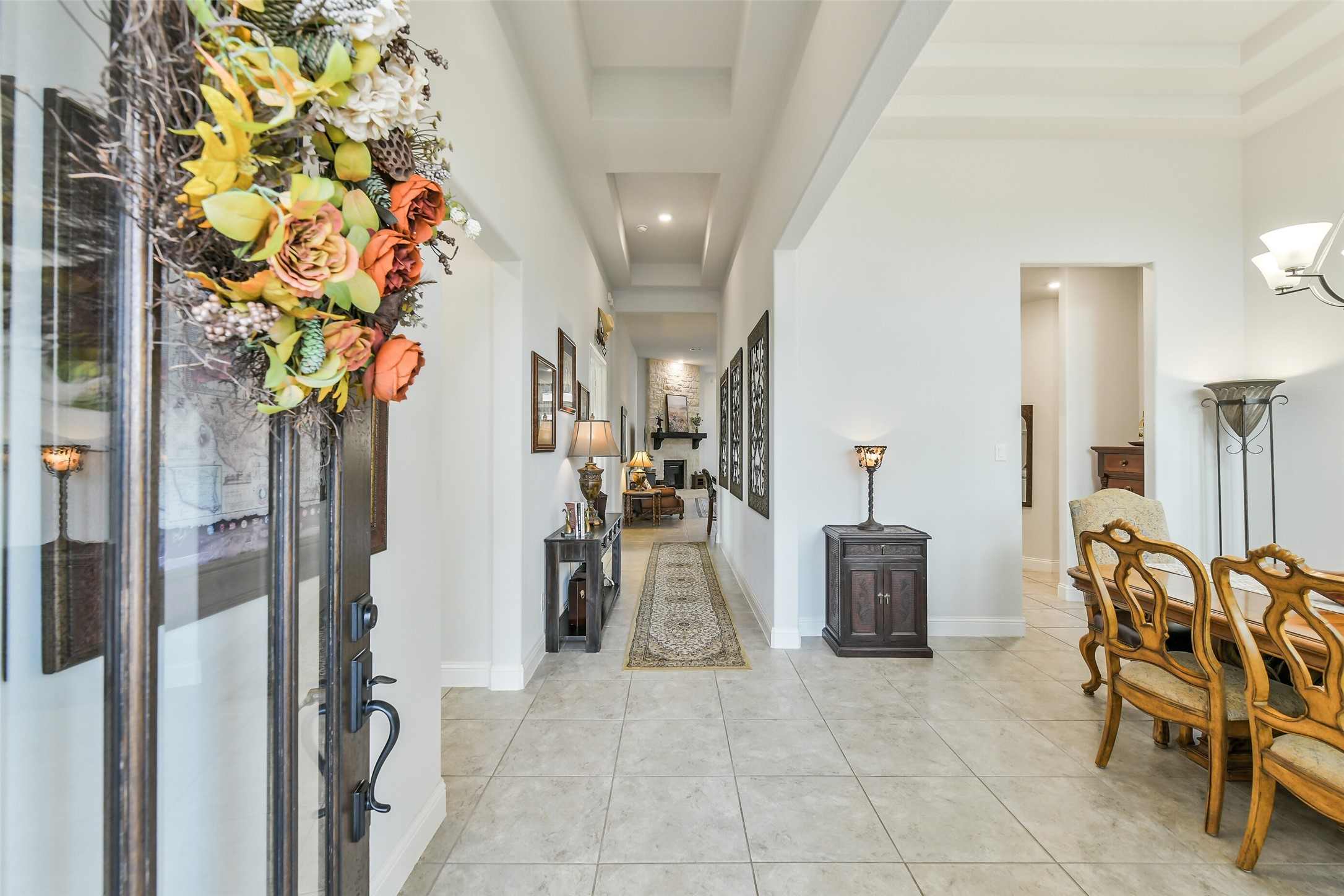19206 Chestnut Colt Trail Tomball, TX 77377 - Photo 5 of 50 a view of a entryway with furniture and a chandelier