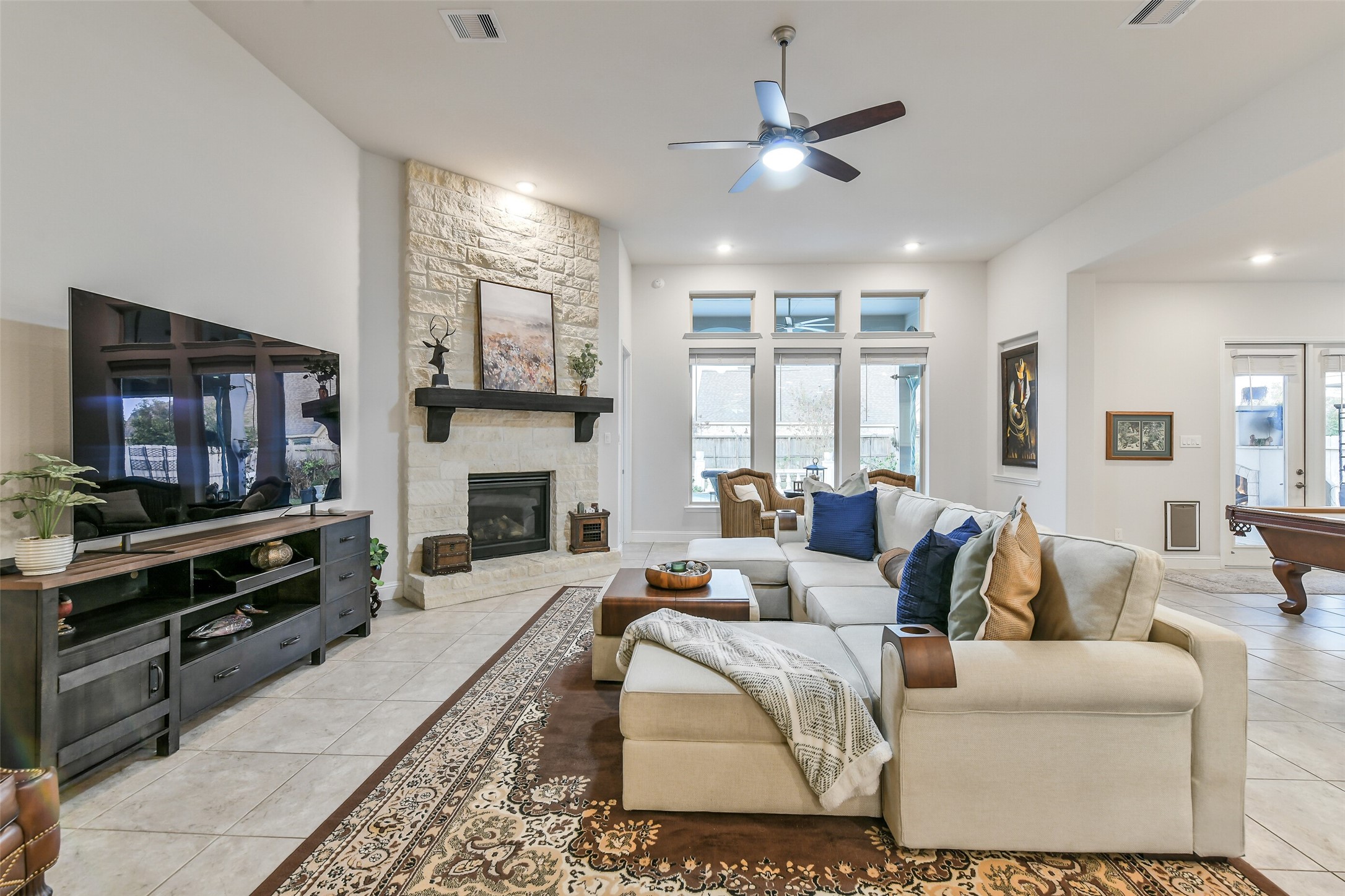 19206 Chestnut Colt Trail Tomball, TX 77377 - Photo 7 of 50 a living room with furniture fireplace and flat screen tv