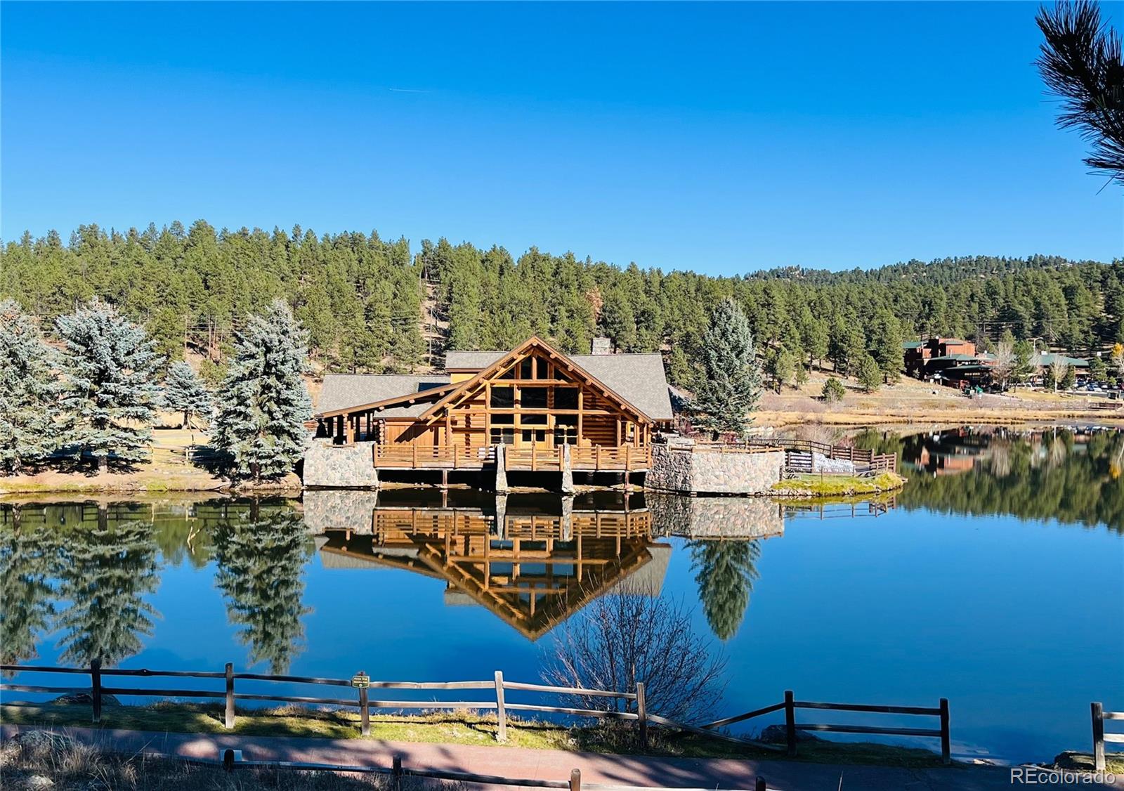 3518 South Saddle Road Evergreen, CO 80439 - Photo 24 of 27 a view of a large building with a ocean view