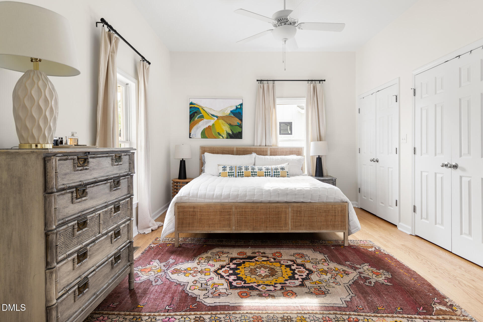 608 Canal Street Durham, NC 27701 - Photo 22 of 36 a bed sitting in a bedroom next to a window