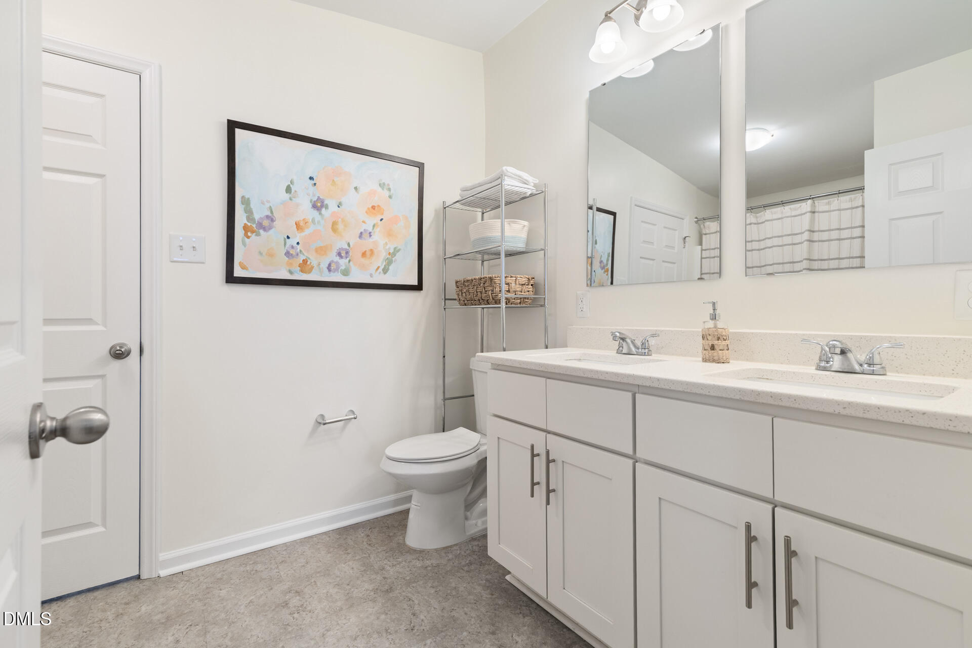 608 Canal Street Durham, NC 27701 - Photo 5 of 36 a bathroom with a toilet sink and mirror