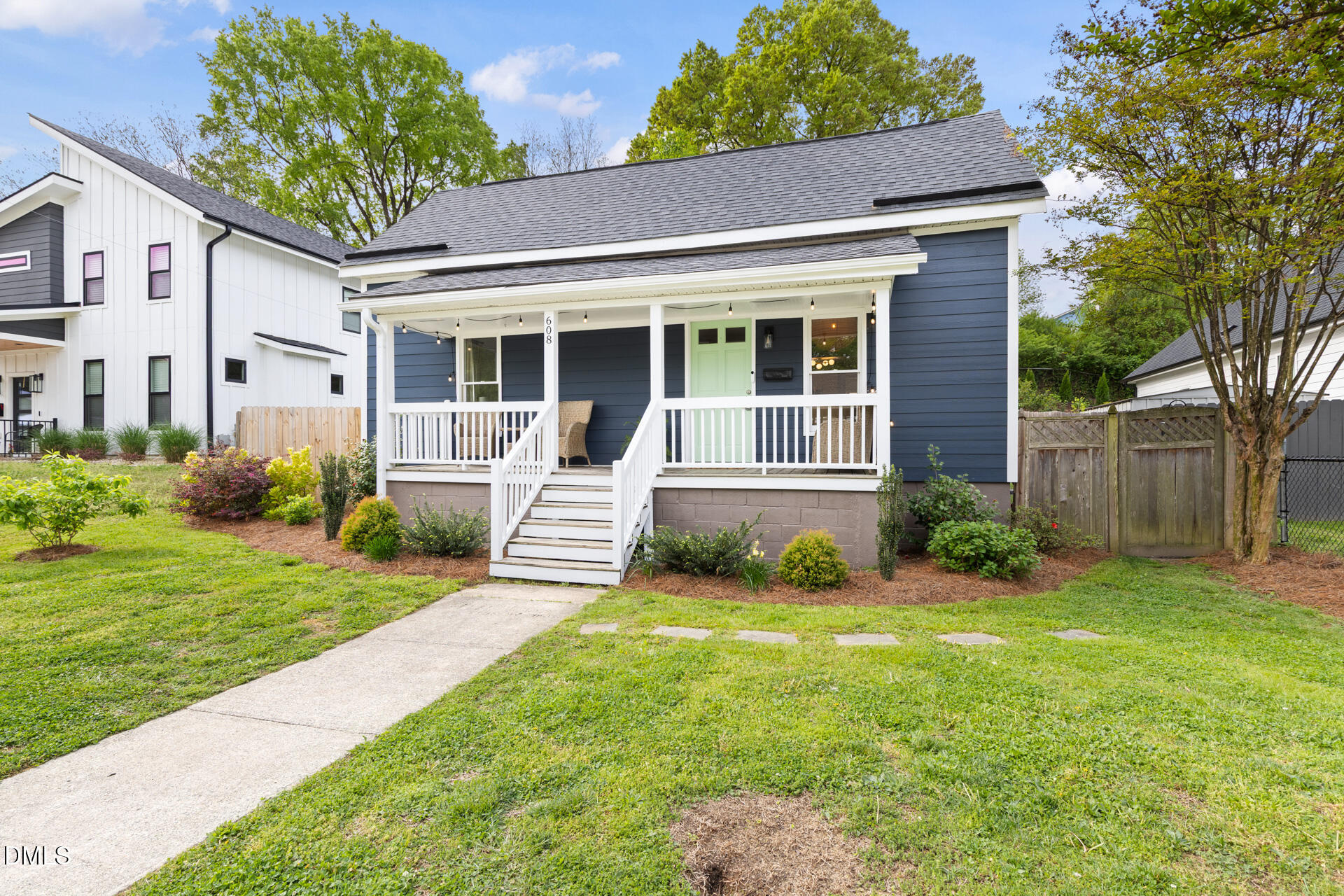 608 Canal Street Durham, NC 27701 - Photo 7 of 36 front view of a house with a yard