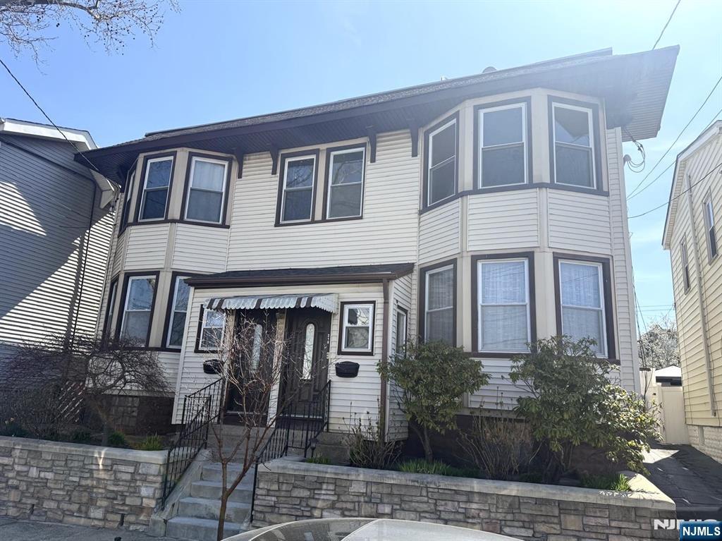 210-212 Maple Street, Unit 2 Kearny, NJ 07032 - Photo 1 of 9 a front view of a house